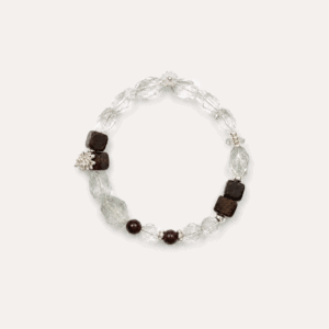 Elegant bracelet with crystal, agarwood, and black beads for wellness.