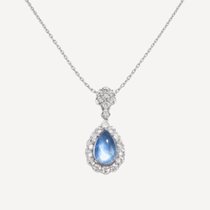 Stunning silver necklace with teardrop blue crystal pendant and sparkling accents.