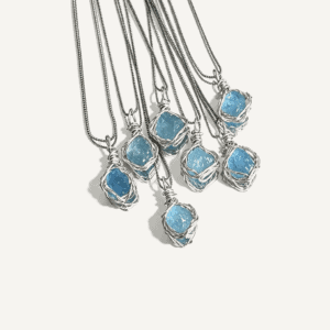 Elegant aquamarine pendants on silver chains for jewelry lovers.