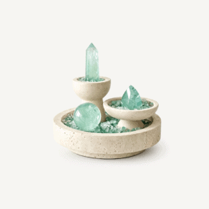 Green fluorite crystals arranged in a modern display for energy healing.