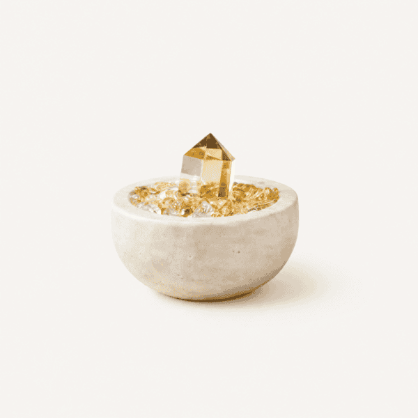 Citrine abundance bowl with a gold crystal on top for positive energy.