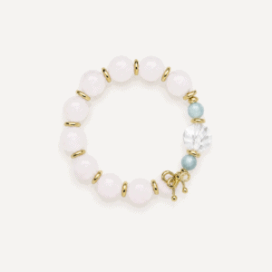 Elegant crystal bow bracelet with white and blue beads and gold accents.