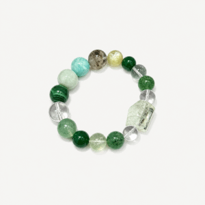 Handcrafted bracelet with green quartz, fluorite, and clear beads for healing and style.