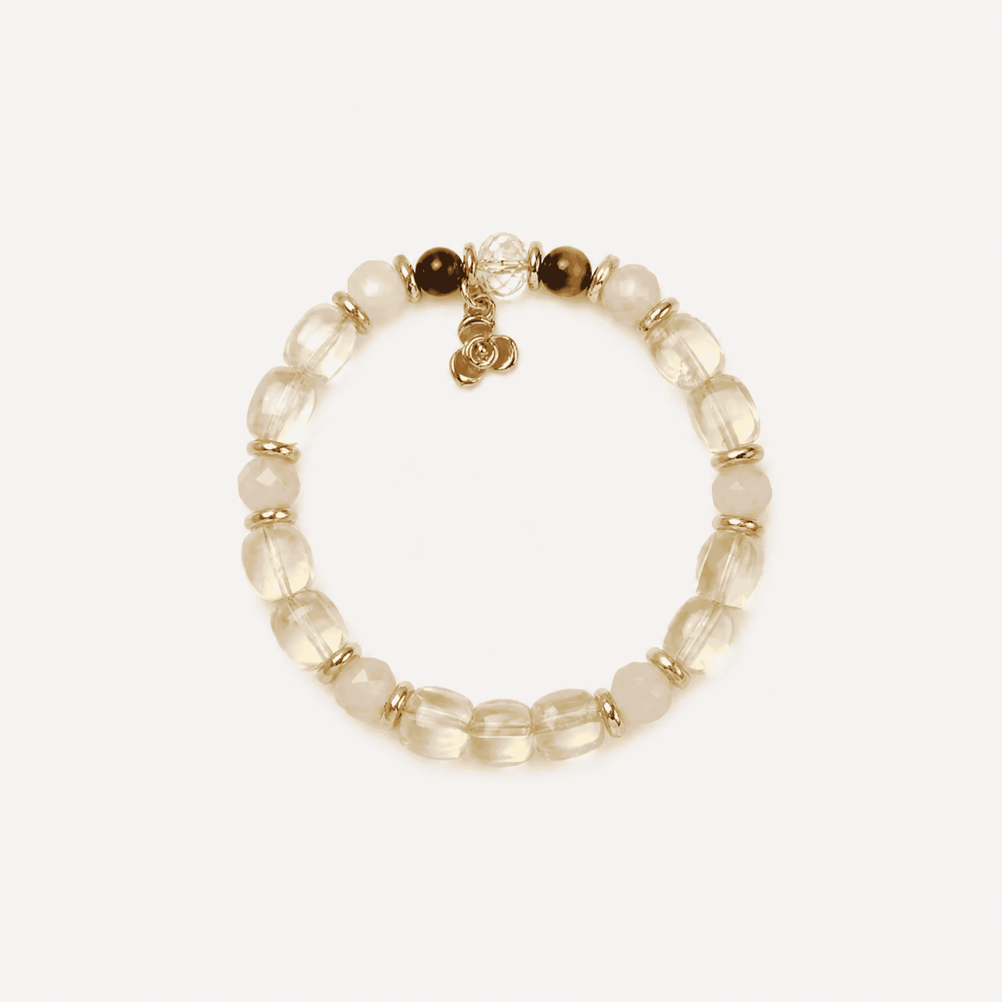 Elegant crystal bow bracelet with pearls and gold accents for jewelry lovers.
