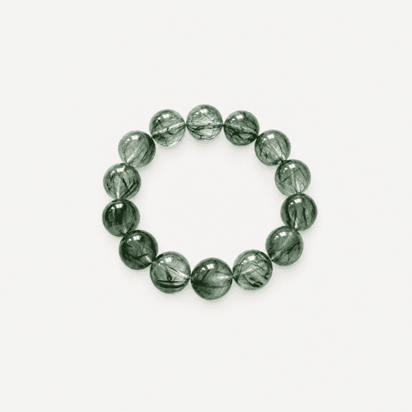 Elegant green rutilated quartz beaded bracelet for jewelry lovers.