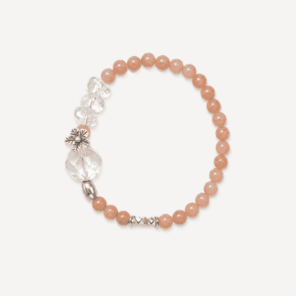 Elegant crystal bracelet with moonlight clear quartz and milk tea beads for spiritual healing.
